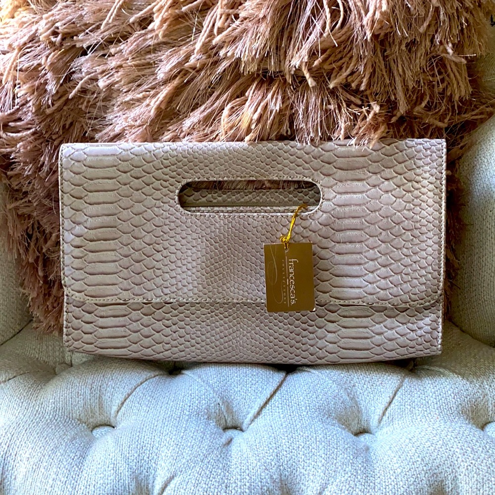 Mauve colored clutch purse. Brand new.